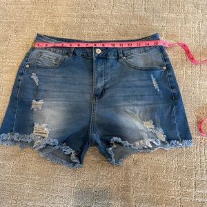 Distressed denim shorts